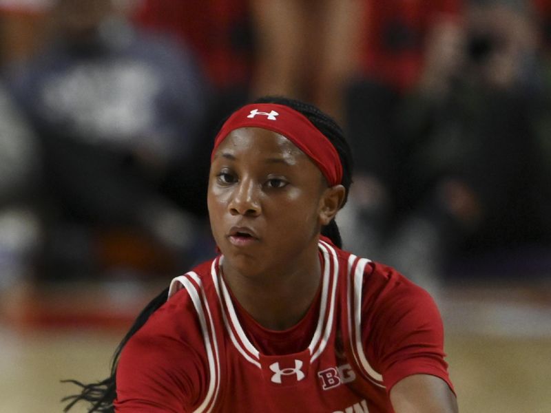 Feb 29, 2024; College Park, Maryland, USA;  Wisconsin Badgers guard Ronnie Porter (13) passes during the first half against the Maryland Terrapins at Xfinity Center. Mandatory Credit: Tommy Gilligan-USA TODAY Sports