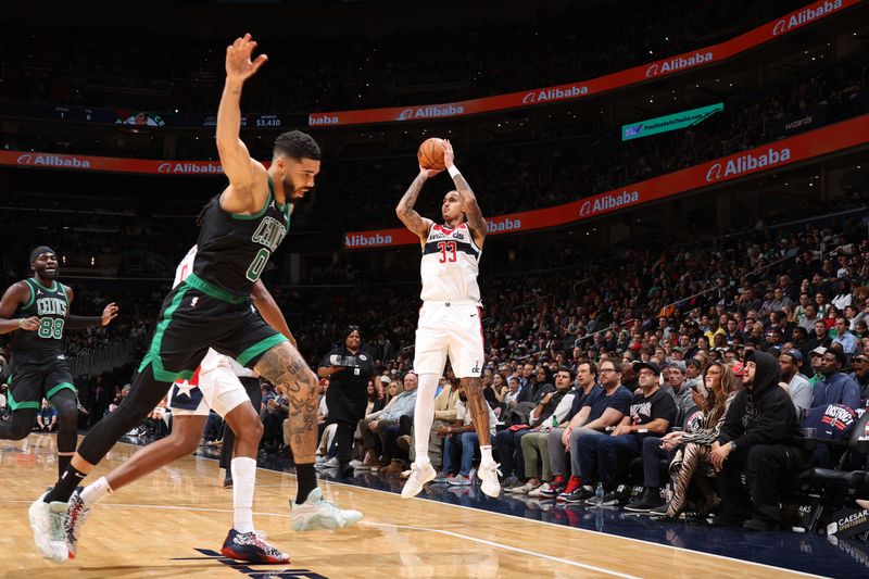 WASHINGTON, DC -? OCTOBER 24: Kyle Kuzma #33 of the Washington Wizards shoots a three point basket during the game against the Boston Celtics on October 24, 2024 at Capital One Arena in Washington, DC. NOTE TO USER: User expressly acknowledges and agrees that, by downloading and or using this Photograph, user is consenting to the terms and conditions of the Getty Images License Agreement. Mandatory Copyright Notice: Copyright 2024 NBAE (Photo by Stephen Gosling/NBAE via Getty Images)