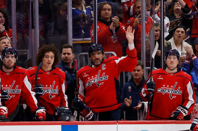 Nov 5, 2025; Washington, District of Columbia, USA; Washington Capitals left wing Alex Ovechkin (8) waves to the crowd after scoring his 900th NHL goal, against the St. Louis Blues, during the second period at Capital One Arena. Mandatory Credit: Geoff Burke-Imagn Images