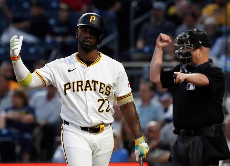 Sep 25, 2024; Pittsburgh, Pennsylvania, USA;  Pittsburgh Pirates designated hitter Andrew McCutchen (22) reacts to being called out on strikes on a check swing appeal by the Milwaukee Brewers during the second inning at PNC Park. Mandatory Credit: Charles LeClaire-Imagn Images