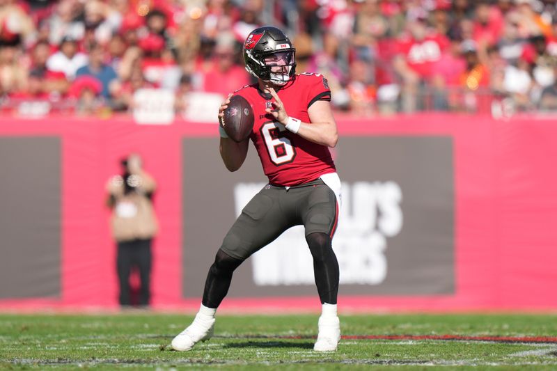 Tampa Bay Buccaneers quarterback Baker Mayfield (6) makes a pass attempt from the pocket during an NFL football game against the New Orleans Saints, Sunday, Dec. 31, 2023, in Tampa, Fla. (AP Photo/Peter Joneleit)