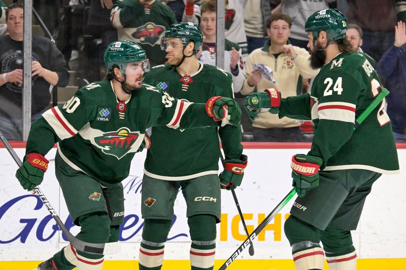 Jan 23, 2024; Saint Paul, Minnesota, USA;  Minnesota Wild forward Marcus Johansson (90) celebrates his goal against the Washington Capitals with defenseman Zach Bogosian (24) during the second period at Xcel Energy Center. Mandatory Credit: Nick Wosika-USA TODAY Sports