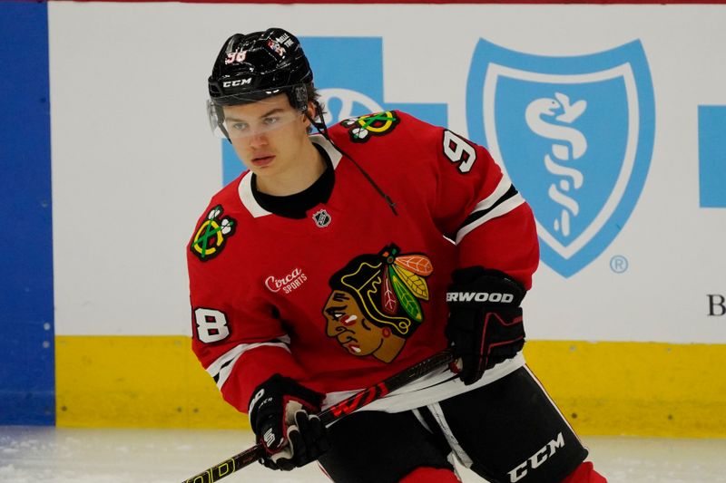 Nov 27, 2024; Chicago, Illinois, USA; Chicago Blackhawks center Connor Bedard (98) warms up before a game against the Dallas Stars at United Center. Mandatory Credit: David Banks-Imagn Images