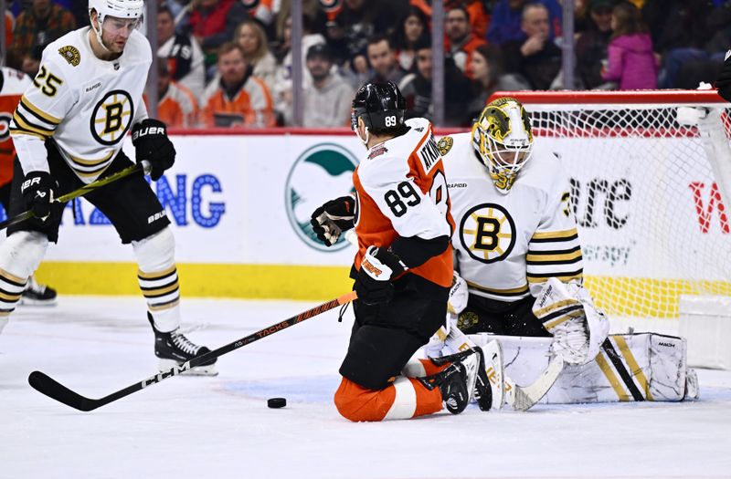 Jan 27, 2024; Philadelphia, Pennsylvania, USA; Philadelphia Flyers right wing Cam Atkinson (89) attempts to deflect a shot against Boston Bruins goalie Linus Ullmark (35) in the second period at Wells Fargo Center. Mandatory Credit: Kyle Ross-USA TODAY Sports