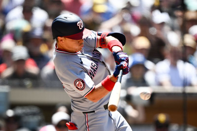 Jun 25, 2025; San Diego, California, USA; Washington Nationals left fielder Alex Call (17) hits a single during the fifth inning against the San Diego Padres at Petco Park. Mandatory Credit: Denis Poroy-Imagn Images