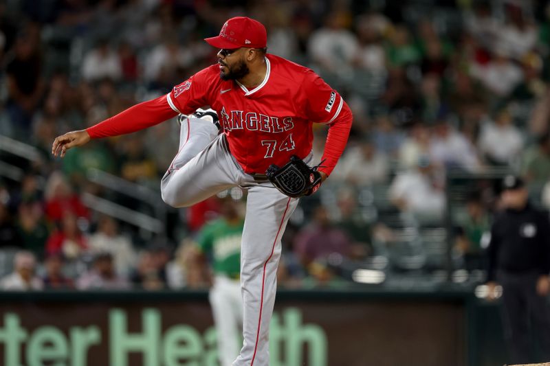 May 19, 2025; West Sacramento, California, USA; Los Angeles Angels pitcher Kenley Jansen (74) delivers a pitch against the Athletics during the ninth inning at Sutter Health Park. Mandatory Credit: Dennis Lee-Imagn Images