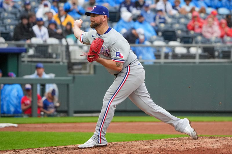 May 5, 2024; Kansas City, Missouri, USA; Texas Rangers pitcher Kirby Yates (39) delivers a pitch against the Kansas City Royals in the ninth inning at Kauffman Stadium. Mandatory Credit: Denny Medley-USA TODAY Sports