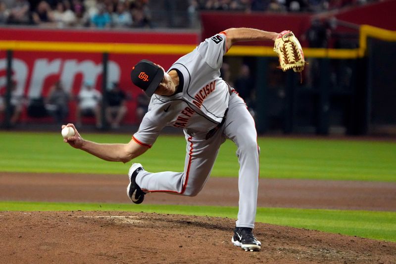 Jun 3, 2024; Phoenix, Arizona, USA; San Francisco Giants pitcher Tyler Rogers (71) throws against the Arizona Diamondbacks in the eighth inning at Chase Field. Mandatory Credit: Rick Scuteri-USA TODAY Sports