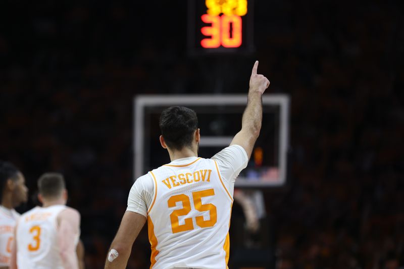 Jan 20, 2024; Knoxville, Tennessee, USA; Tennessee Volunteers guard Santiago Vescovi (25) reacts after shooting a three-point shot against the Alabama Crimson Tide during the second half at Thompson-Boling Arena at Food City Center. Mandatory Credit: Randy Sartin-USA TODAY Sports