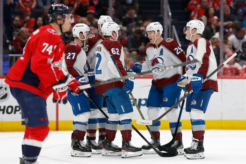 Feb 13, 2024; Washington, District of Columbia, USA; Colorado Avalanche right wing Mikko Rantanen (96) celebrates with teammates after scoring a goal against the Washington Capitals in the second period at Capital One Arena. Mandatory Credit: Geoff Burke-USA TODAY Sports