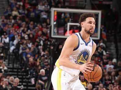 PORTLAND, OR - DECEMBER 17:  Klay Thompson #11 of the Golden State Warriors handles the ball during the game  on December 17, 2023 at the Moda Center Arena in Portland, Oregon. NOTE TO USER: User expressly acknowledges and agrees that, by downloading and or using this photograph, user is consenting to the terms and conditions of the Getty Images License Agreement. Mandatory Copyright Notice: Copyright 2023 NBAE (Photo by David Sherman/NBAE via Getty Images)