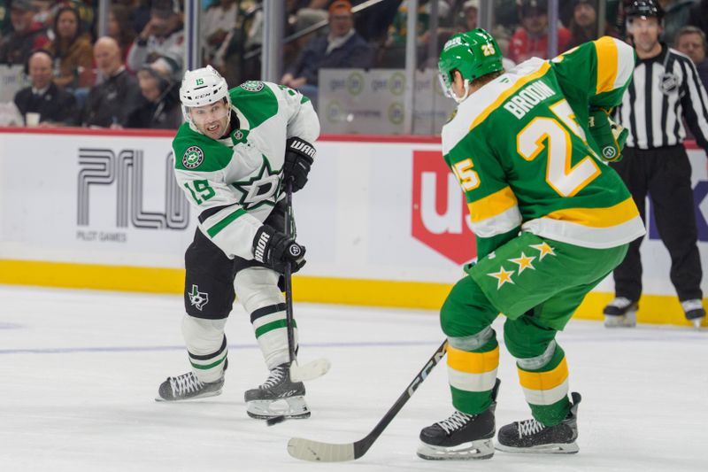 Dec 11, 2025; Saint Paul, Minnesota, USA; Dallas Stars center Colin Blackwell (15) shoots as Minnesota Wild defenseman Jonas Brodin (25) attempts to block the shot in the second period at Grand Casino Arena. Mandatory Credit: Matt Blewett-Imagn Images