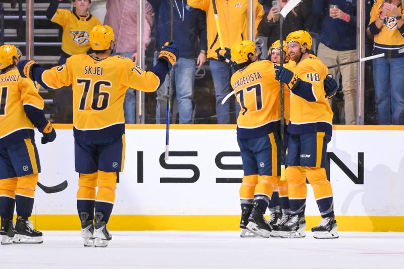 Oct 11, 2025; Nashville, Tennessee, USA;  Nashville Predators left wing Erik Haula (56) celebrates with his teammates after scoring a goal against the Utah Mammoth during the second period at Bridgestone Arena. Mandatory Credit: Steve Roberts-Imagn Images