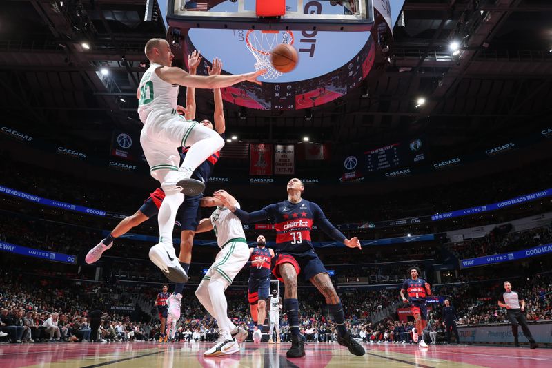 WASHINGTON, DC -? NOVEMBER 22: Sam Hauser #30 of the Boston Celtics passes the ball during the game against the Washington Wizards during the Emirates NBA Cup game on November 22, 2024 at Capital One Arena in Washington, DC. NOTE TO USER: User expressly acknowledges and agrees that, by downloading and or using this Photograph, user is consenting to the terms and conditions of the Getty Images License Agreement. Mandatory Copyright Notice: Copyright 2024 NBAE (Photo by Stephen Gosling/NBAE via Getty Images)