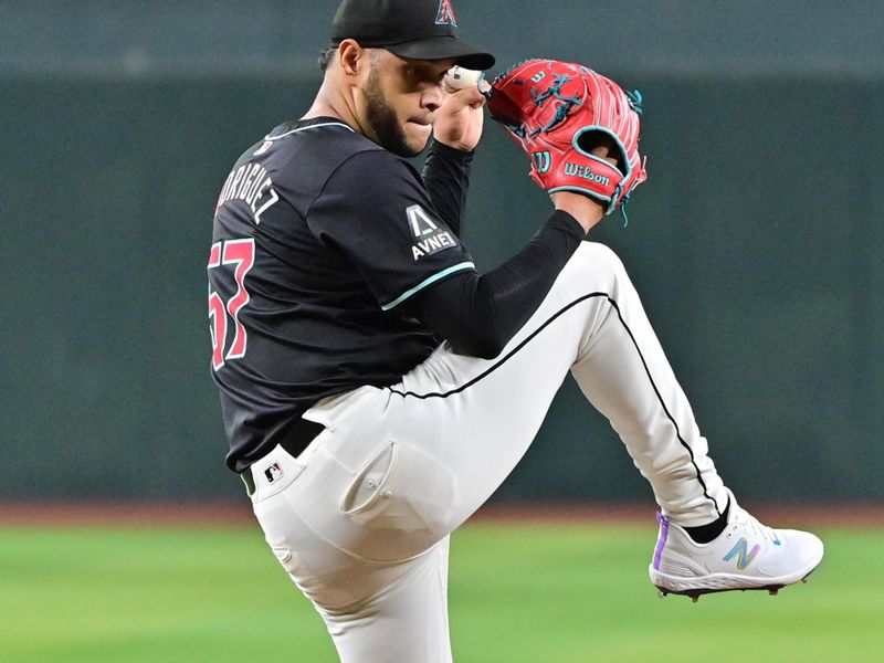 Sep 23, 2024; Phoenix, Arizona, USA;  Arizona Diamondbacks pitcher Eduardo Rodriguez (57) throws in the first inning against the San Francisco Giants at Chase Field. Mandatory Credit: Matt Kartozian-Imagn Images