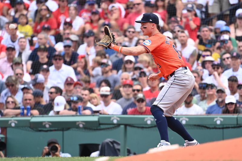 Aug 11, 2024; Boston, Massachusetts, USA; Houston Astros first baseman Zach Dezenzo (9) makes a catch for an out against the Boston Red Sox during the fourth inning at Fenway Park. Mandatory Credit: Eric Canha-USA TODAY Sports