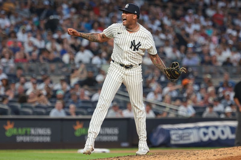 Jul 7, 2024; Bronx, New York, USA; New York Yankees starting pitcher Luis Gil (81) reacts after a strike out during the fifth inning against the Boston Red Sox at Yankee Stadium. Mandatory Credit: Vincent Carchietta-USA TODAY Sports