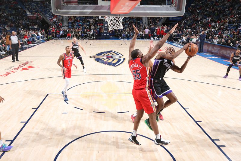 NEW ORLEANS, LA - DECEMBER 12: De'Aaron Fox #5 of the Sacramento Kings drives to the basket during the game against the New Orleans Pelicans on December 12, 2024 at the Smoothie King Center in New Orleans, Louisiana. NOTE TO USER: User expressly acknowledges and agrees that, by downloading and or using this Photograph, user is consenting to the terms and conditions of the Getty Images License Agreement. Mandatory Copyright Notice: Copyright 2024 NBAE (Photo by Layne Murdoch Jr./NBAE via Getty Images)