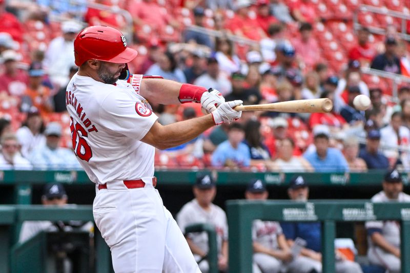 Jun 26, 2024; St. Louis, Missouri, USA;  St. Louis Cardinals first baseman Paul Goldschmidt (46) hits a double against the Atlanta Braves during the second inning at Busch Stadium. Mandatory Credit: Jeff Curry-USA TODAY Sports