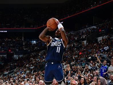 SAN ANTONIO, TX - OCTOBER 25: Kyrie Irving #11 of the Dallas Mavericks shoots a three point basket during the game against the San Antonio Spurs on October 25, 2023 at the Frost Bank Center in San Antonio, Texas. NOTE TO USER: User expressly acknowledges and agrees that, by downloading and or using this photograph, user is consenting to the terms and conditions of the Getty Images License Agreement. Mandatory Copyright Notice: Copyright 2023 NBAE (Photos by Michael Gonzales/NBAE via Getty Images)