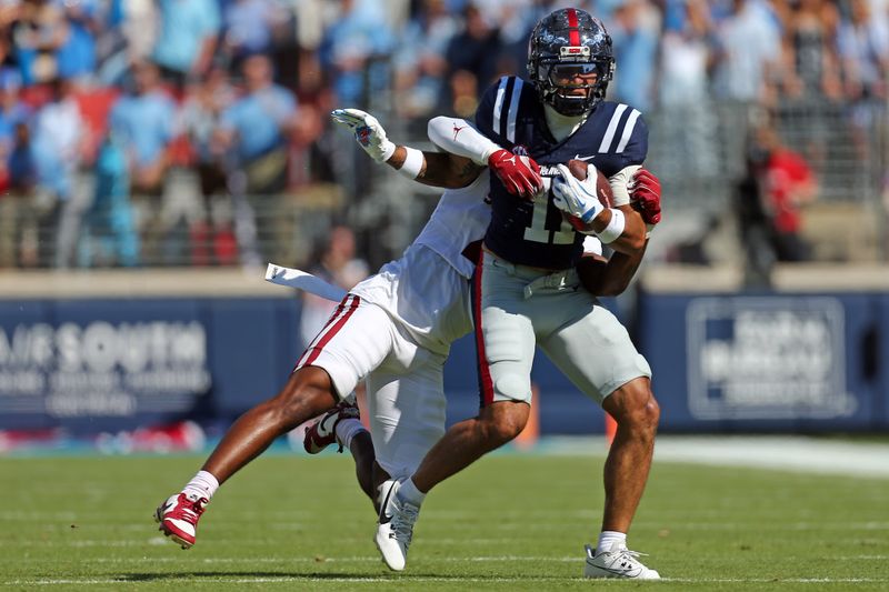 Oct 26, 2024; Oxford, Mississippi, USA; Mississippi Rebels wide receiver Jordan Watkins (11) runs after a catch during the first half against the Oklahoma Sooners at Vaught-Hemingway Stadium. Mandatory Credit: Petre Thomas-Imagn Images