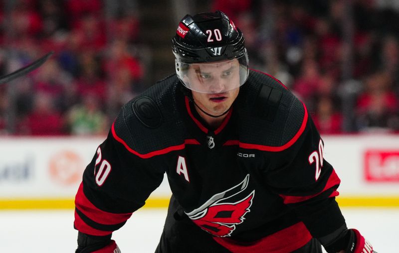 Apr 22, 2024; Raleigh, North Carolina, USA; Carolina Hurricanes center Sebastian Aho (20) looks on against the New York Islanders during the third period in game two of the first round of the 2024 Stanley Cup Playoffs at PNC Arena. Mandatory Credit: James Guillory-USA TODAY Sports