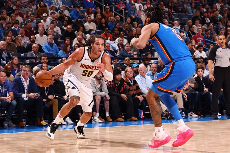 OKLAHOMA CITY, OK - JANUARY 31: Aaron Gordon #50 of the Denver Nuggets dribbles the ball during the game against the Oklahoma City Thunder on January 31, 2024 at Paycom Arena in Oklahoma City, Oklahoma. NOTE TO USER: User expressly acknowledges and agrees that, by downloading and or using this photograph, User is consenting to the terms and conditions of the Getty Images License Agreement. Mandatory Copyright Notice: Copyright 2024 NBAE (Photo by Zach Beeker/NBAE via Getty Images)