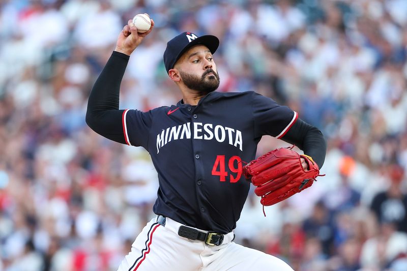 Aug 24, 2024; Minneapolis, Minnesota, USA; Minnesota Twins starting pitcher Pablo Lopez (49) delivers a pitch against the St. Louis Cardinals during the first inning at Target Field. Mandatory Credit: Matt Krohn-USA TODAY Sports