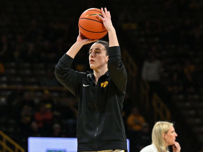 Feb 8, 2024; Iowa City, Iowa, USA; Iowa Hawkeyes guard Caitlin Clark (22) warms up before the game against the Penn State Nittany Lions at Carver-Hawkeye Arena. Mandatory Credit: Jeffrey Becker-USA TODAY Sports