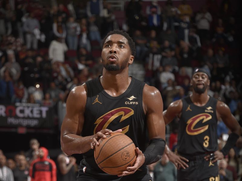 CLEVELAND, OH - November 15: Donovan Mitchell #45 of the Cleveland Cavaliers shoots a free throw during the game against the Chicago Bulls during the Emirates NBA Cup game on November 15, 2024 at Rocket Mortgage FieldHouse in Cleveland, Ohio. NOTE TO USER: User expressly acknowledges and agrees that, by downloading and/or using this Photograph, user is consenting to the terms and conditions of the Getty Images License Agreement. Mandatory Copyright Notice: Copyright 2024 NBAE (Photo by David Liam Kyle/NBAE via Getty Images)