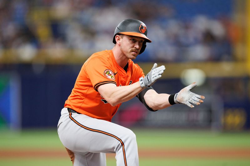 Jun 8, 2024; St. Petersburg, Florida, USA;  Baltimore Orioles third baseman Jordan Westburg (11) reacts after hitting an rbi triple against the Tampa Bay Rays in the eighth inning at Tropicana Field. Mandatory Credit: Nathan Ray Seebeck-USA TODAY Sports