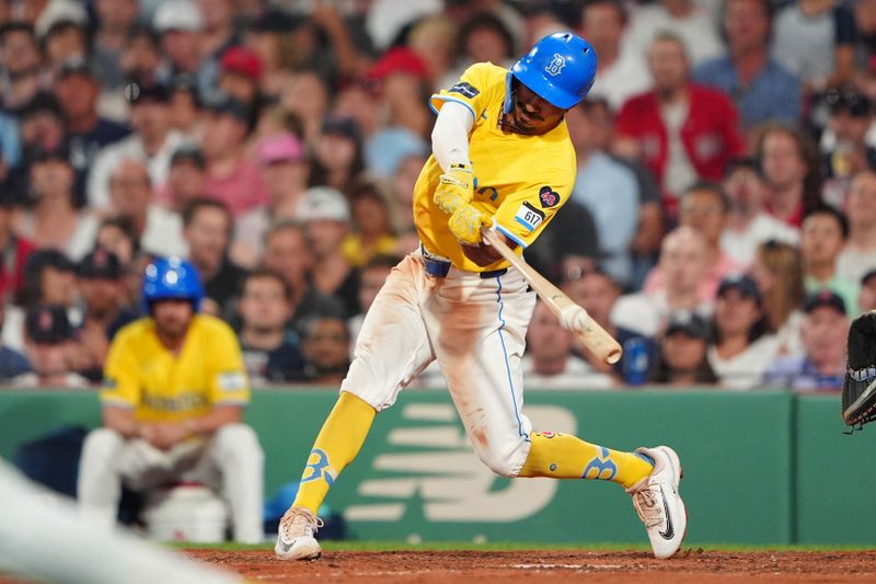 Jul 27, 2024; Boston, Massachusetts, USA; Boston Red Sox second baseman David Hamilton (70) hits an RBI double against the New York Yankees during the seventh inning at Fenway Park. Mandatory Credit: Gregory Fisher-USA TODAY Sports