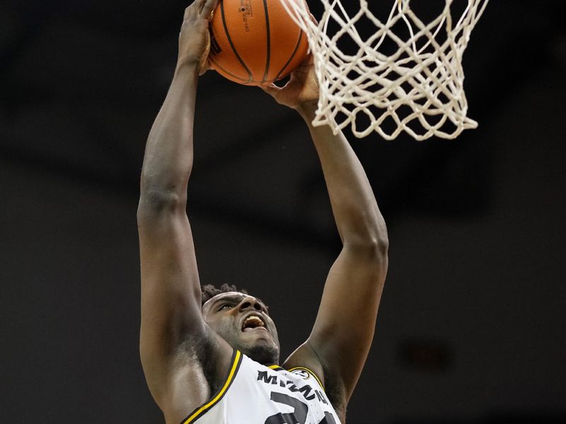 Feb 1, 2023; Columbia, Missouri, USA; Missouri Tigers guard Kobe Brown (24) dunks the ball during the first half against the LSU Tigers at Mizzou Arena. Mandatory Credit: Jay Biggerstaff-USA TODAY Sports