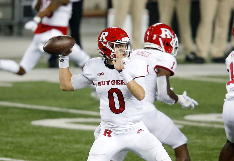 Nov 7, 2020; Columbus, Ohio, USA; Rutgers Scarlet Knights quarterback Noah Vedral (0) throws during the first quarter against the Ohio State Buckeyes at Ohio Stadium. Mandatory Credit: Joseph Maiorana-USA TODAY Sports