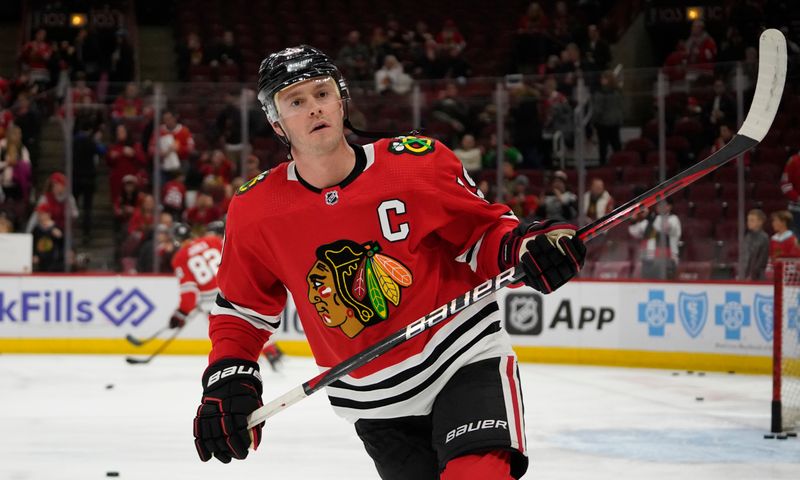 Jan 22, 2023; Chicago, Illinois, USA; Chicago Blackhawks center Jonathan Toews (19) warms up before the game against the Los Angeles Kings at United Center. Mandatory Credit: David Banks-USA TODAY Sports