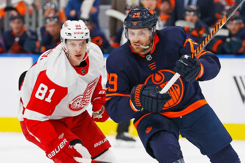 Feb 15, 2023; Edmonton, Alberta, CAN; Edmonton Oilers forward Leon Draisaitl (29) and Detroit Red Wings forward Dominik Kubalik (81) look for a loose puck during the first period at Rogers Place. Mandatory Credit: Perry Nelson-USA TODAY Sports