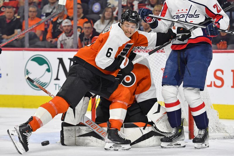 Apr 16, 2024; Philadelphia, Pennsylvania, USA; Philadelphia Flyers defenseman Travis Sanheim (6) blocks  a shot attempt against the Washington Capitals during the first period at Wells Fargo Center. Mandatory Credit: Eric Hartline-USA TODAY Sports