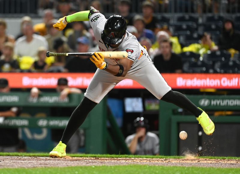 Aug 3, 2024; Pittsburgh, Pennsylvania, USA;  Arizona Diamondbacks batter Geraldo Perdomo (2) is hit by a pitch against the Pittsburgh Pirates duiring the fifth inning at PNC Park. Mandatory Credit: Philip G. Pavely-USA TODAY Sports