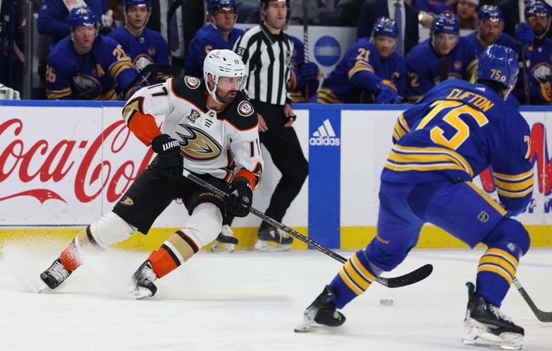 Feb 19, 2024; Buffalo, New York, USA;  Anaheim Ducks left wing Alex Killorn (17) plays the puck during the third period against the Buffalo Sabres at KeyBank Center. Mandatory Credit: Timothy T. Ludwig-USA TODAY Sports