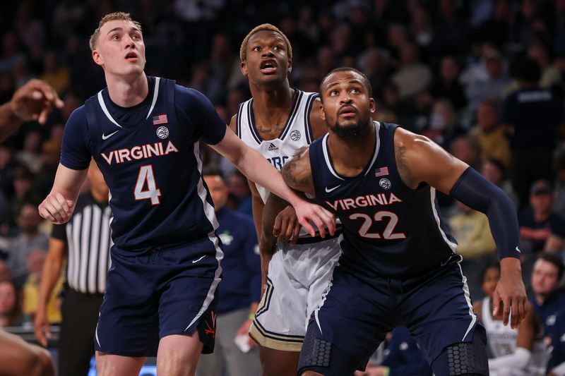 Jan 20, 2024; Atlanta, Georgia, USA; Virginia Cavaliers guard Andrew Rohde (4) and forward Jordan Minor (22) box out Georgia Tech Yellow Jackets guard Kowacie Reeves Jr. (14) in the second half at McCamish Pavilion. Mandatory Credit: Brett Davis-USA TODAY Sports