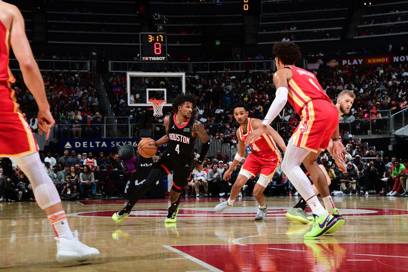 ATLANTA, GA - FEBRUARY 10: Jalen Green #4 of the Houston Rockets drives to the basket during the game against the Atlanta Hawks on February 10, 2024 at State Farm Arena in Atlanta, Georgia.  NOTE TO USER: User expressly acknowledges and agrees that, by downloading and/or using this Photograph, user is consenting to the terms and conditions of the Getty Images License Agreement. Mandatory Copyright Notice: Copyright 2024 NBAE (Photo by Scott Cunningham/NBAE via Getty Images)