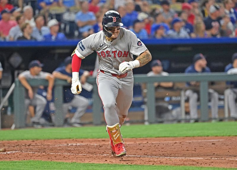 Aug 5, 2024; Kansas City, Missouri, USA;  Boston Red Sox left fielder Jarren Duran (16) runs up the first base line after hitting a two run double in the sixth inning against the Kansas City Royals at Kauffman Stadium. Mandatory Credit: Peter Aiken-USA TODAY Sports