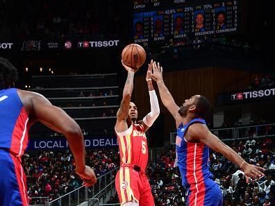 ATLANTA, GA - DECEMBER 18: Dejounte Murray #5 of the Atlanta Hawks shoots the ball during the game  on December 18, 2023 at State Farm Arena in Atlanta, Georgia.  NOTE TO USER: User expressly acknowledges and agrees that, by downloading and/or using this Photograph, user is consenting to the terms and conditions of the Getty Images License Agreement. Mandatory Copyright Notice: Copyright 2023 NBAE (Photo by Scott Cunningham/NBAE via Getty Images)