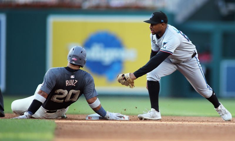 Sep 14, 2024; Washington, District of Columbia, USA; Washington Nationals catcher Keibert Ruiz (20) steals second base during the sixth inning of a baseball game against the Miami Marlins, at Nationals Park. Mandatory Credit: Daniel Kucin Jr.-Imagn Images