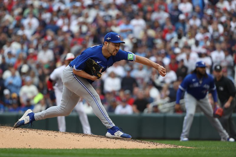 Oct 4, 2023; Minneapolis, Minnesota, USA; Toronto Blue Jays starting pitcher Yusei Kikuchi (16) delivers a pitch in in the fourth inning against the Minnesota Twins during game two of the Wildcard series for the 2023 MLB playoffs at Target Field. Mandatory Credit: Jesse Johnson-USA TODAY Sports