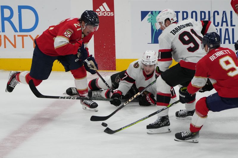 Feb 20, 2024; Sunrise, Florida, USA; Florida Panthers center Nick Cousins (21) battles for a loose puck with Ottawa Senators right wing Vladimir Tarasenko (91) during the second period at Amerant Bank Arena. Mandatory Credit: Jim Rassol-USA TODAY Sports