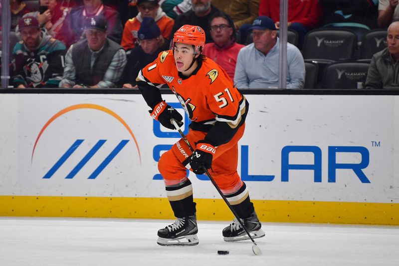 Feb 3, 2026; Anaheim, California, USA; Anaheim Ducks defenseman Olen Zellweger (51) controls the puck against the Seattle Kraken during the first period at Honda Center. Mandatory Credit: Gary A. Vasquez-Imagn Images