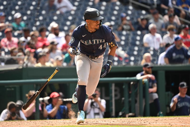 May 26, 2024; Washington, District of Columbia, USA; Seattle Mariners center fielder Julio Rodriguez (44) drops his bat after a base hit against the Washington Nationals during the ninth inning at Nationals Park. Mandatory Credit: Rafael Suanes-USA TODAY Sports