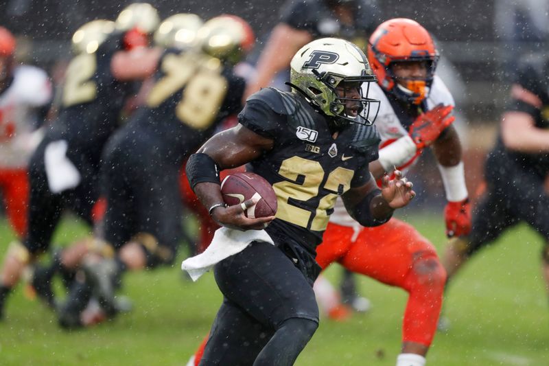 Oct 26, 2019; West Lafayette, IN, USA; Purdue Boilermakers running back King Doerue (22) runs with the ball against the Illinois Fighting Illini during the fourth quarter at Ross-Ade Stadium. Mandatory Credit: Brian Spurlock-USA TODAY Sports