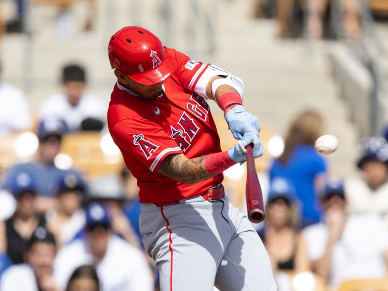 Mar 1, 2026; Phoenix, Arizona, USA; Los Angeles Angels designated hitter Vaughn Grissom hits a home run against the Los Angeles Dodgers during a spring training game at Camelback Ranch-Glendale. Mandatory Credit: Mark J. Rebilas-Imagn Images
